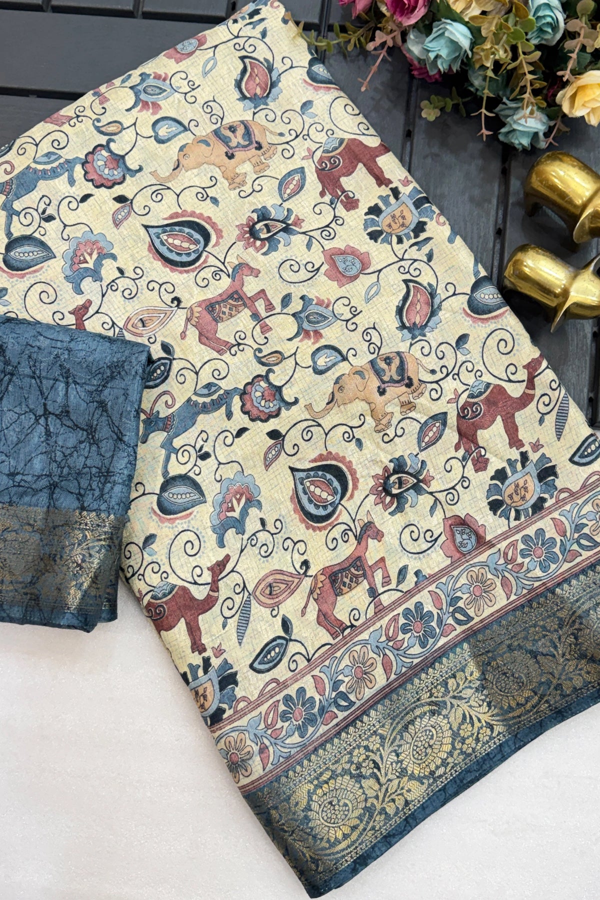 Ivory Kalamkari Saree with Teal Zari Border