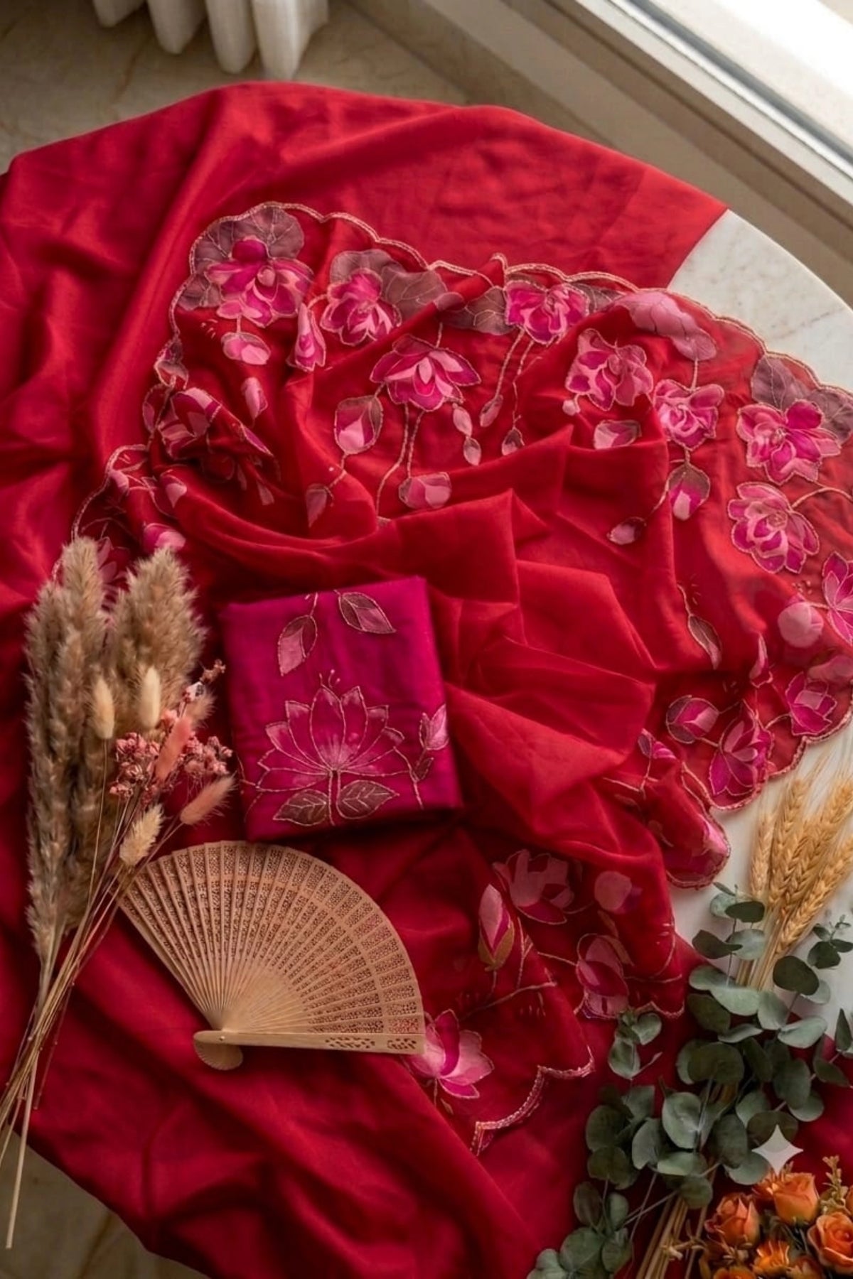 Ruby Red Organza Saree with Pink Floral Scalloped Border