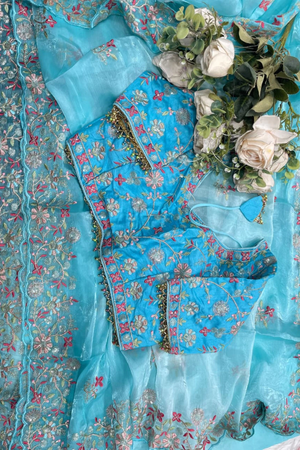 Aqua Blue Organza Saree with Floral Embroidery