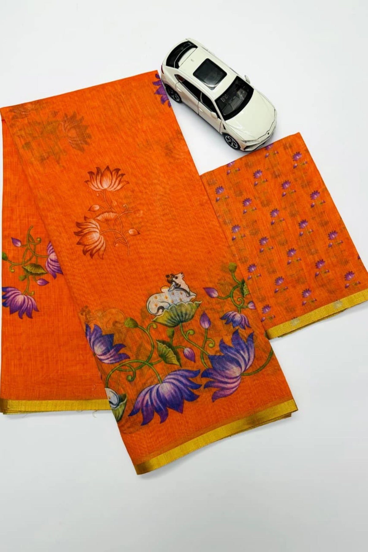 Tangerine Orange Linen Silk Saree with Lotus & Cow Print