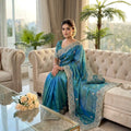 Turquoise Teal Tissue Organza Saree with Heavy Embroidered Border